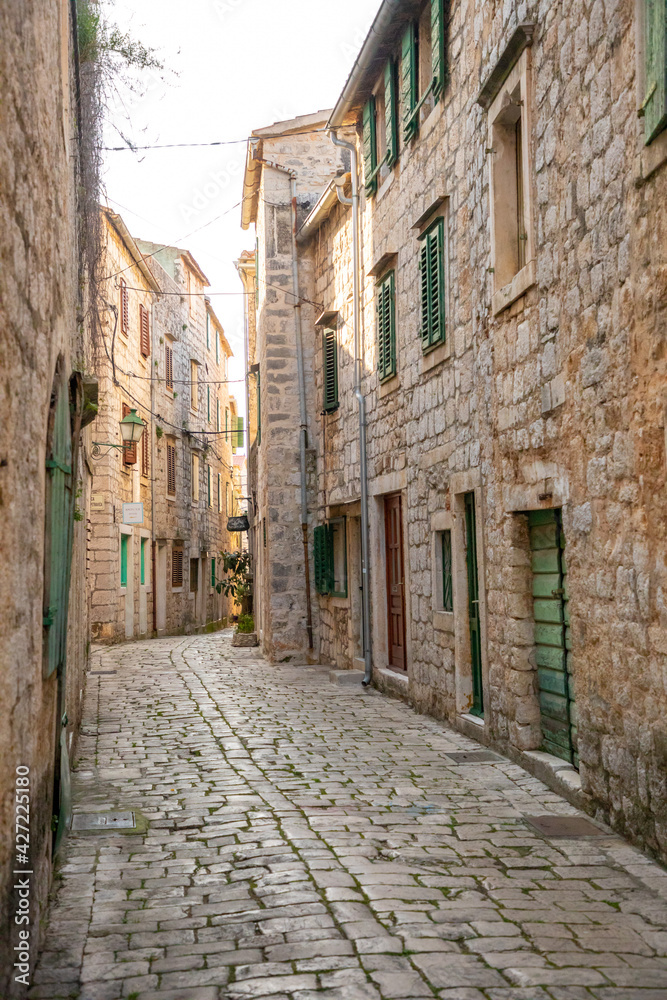 Old street without tourists in Stari Grad, Croatia