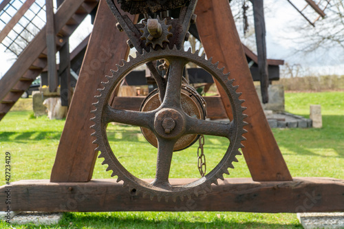 Old rusty gearwheel on a windmill