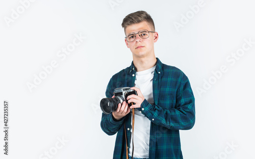 happy childhood. stylish boy making photo. trendy looking teenager with camera. child photographer