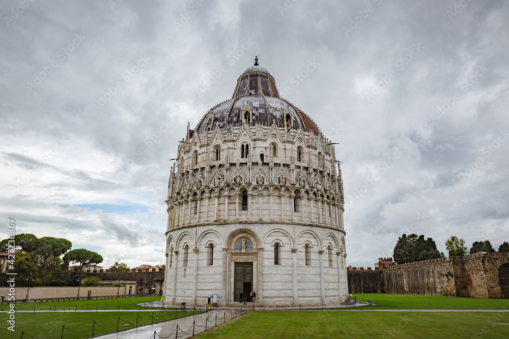 View of The Pisa Baptistery on Piazza dei Miracoli in Pisa, Tuscany, Italy.