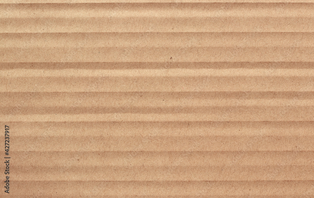 Brown cardboard sheet abstract background, texture of recycle paper box in old vintage pattern for design art work. Brown cardboard sheet abstract background, texture of recycle paper box in old vintage pattern for design art work.