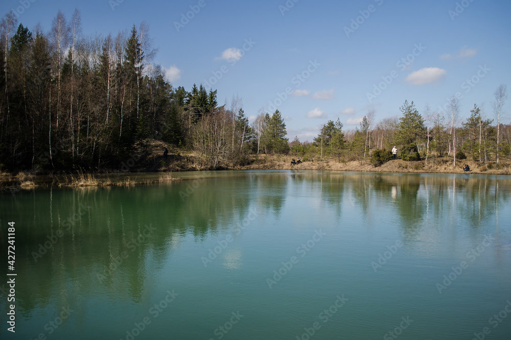 View of small green blue Lackroga lake, Latvia View of small green blue Lackroga lake, Latvia