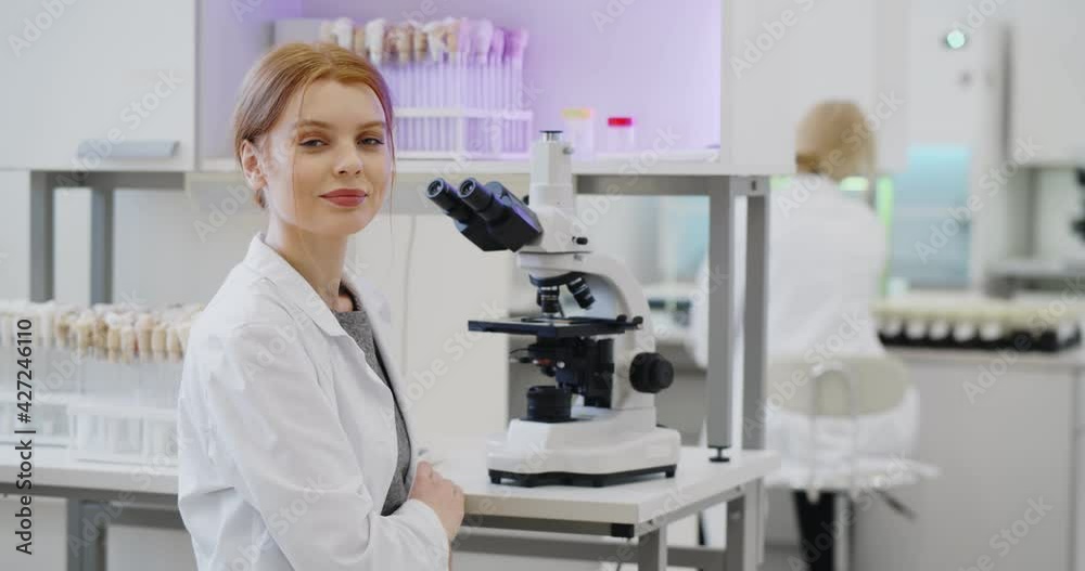Pharmacy scientist working with professional microscope in technology lab. Pharmacy scientist working with professional microscope in technology lab.