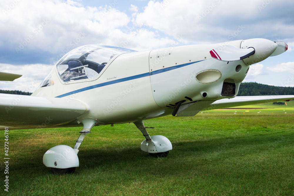 Sports airplane nose stretches far forward Sports airplane nose stretches far forward
