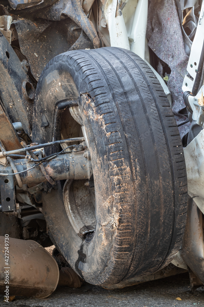 Close-up of the old tires of the car wheels were demolished.