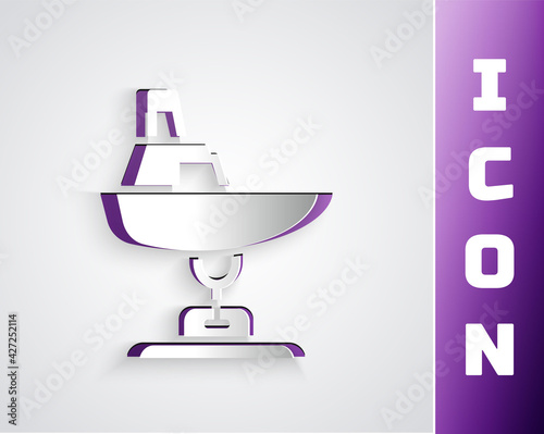 Paper cut Swing boat on the playground icon isolated on grey background. Childrens carousel with boat. Amusement icon. Paper art style. Vector