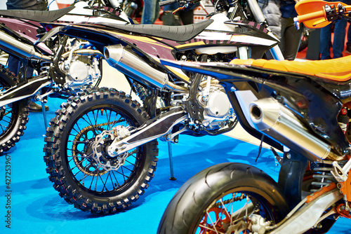 Motocross bikes in a sports store © Sergey Ryzhov