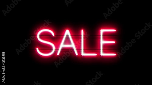 Sale neon sign appear on black background.