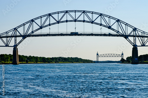 The Bourne Bridge in Bourne, Massachusetts spans the Cape Cod Canal.  Winner in 1934 of the American Institute of Steel Construction's  "Most Beautiful Steel Bridge" Award.    © maria t hoffman