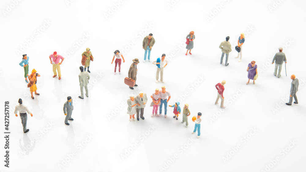 miniature people. different people stand on a white background. communication of society of different generations miniature people. different people stand on a white background. communication of society of different generations