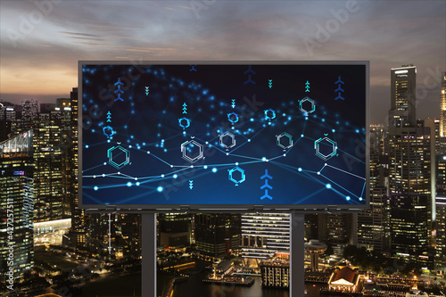 Information flow hologram on road billboard  night panorama city view of Singapore. The largest technological center in Southeast Asia. The concept of programming science.