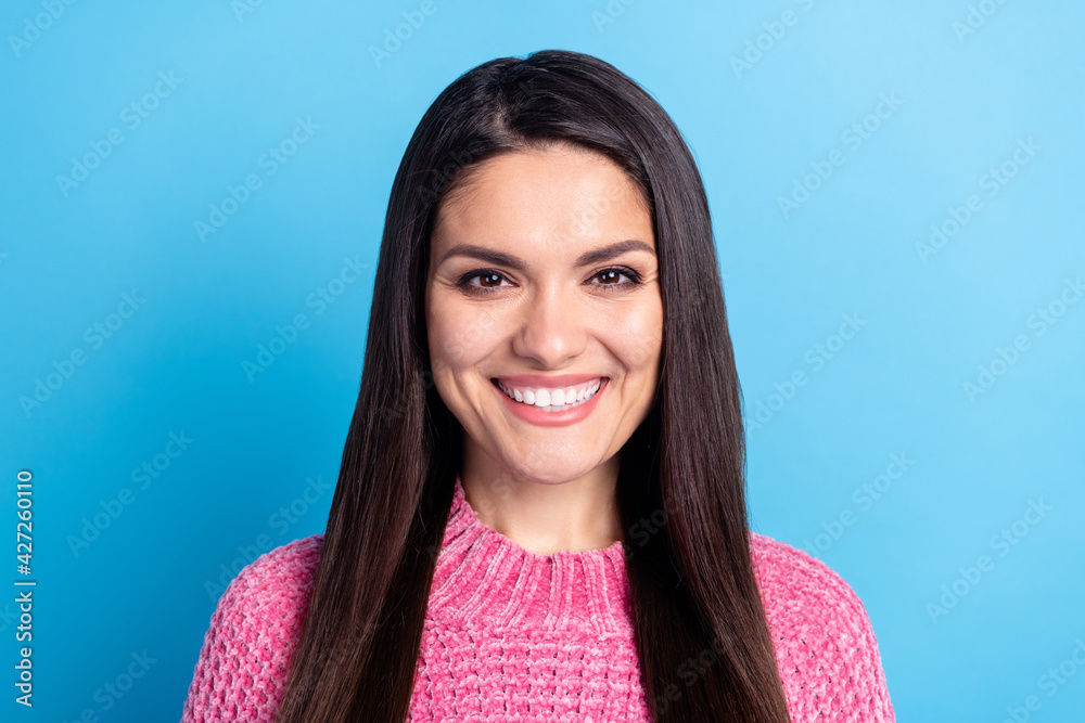 Fototapeta premium Photo of friendly satisfied person toothy smile look camera wear sweater isolated on blue color background