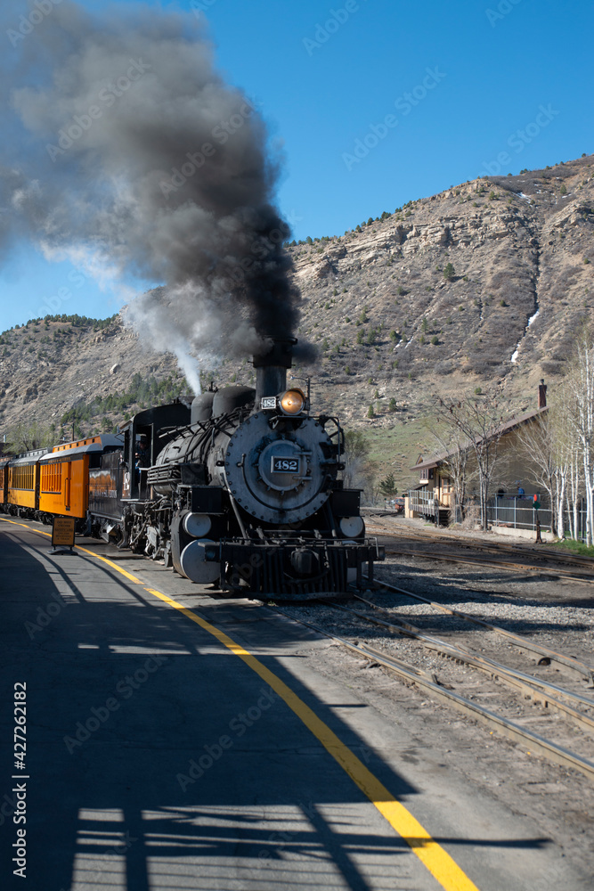 Obraz premium steam train in the mountains