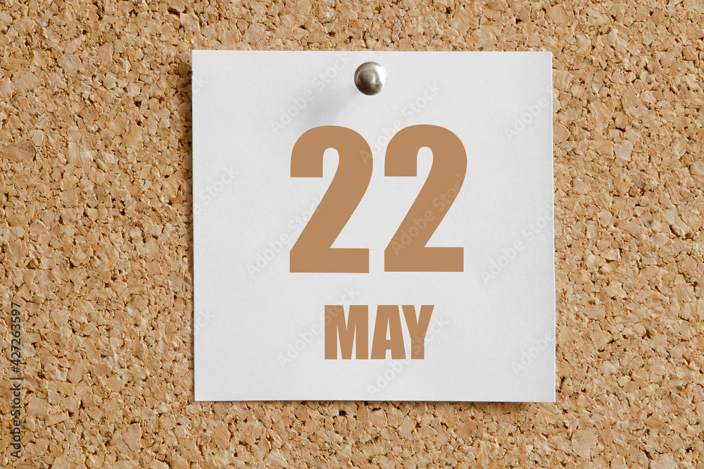may 22. 22th day of the month, calendar date. White calendar sheet attached to brown cork board.Spring month, day of the year concept may 22. 22th day of the month, calendar date. White calendar sheet attached to brown cork board.Spring month, day of the year concept