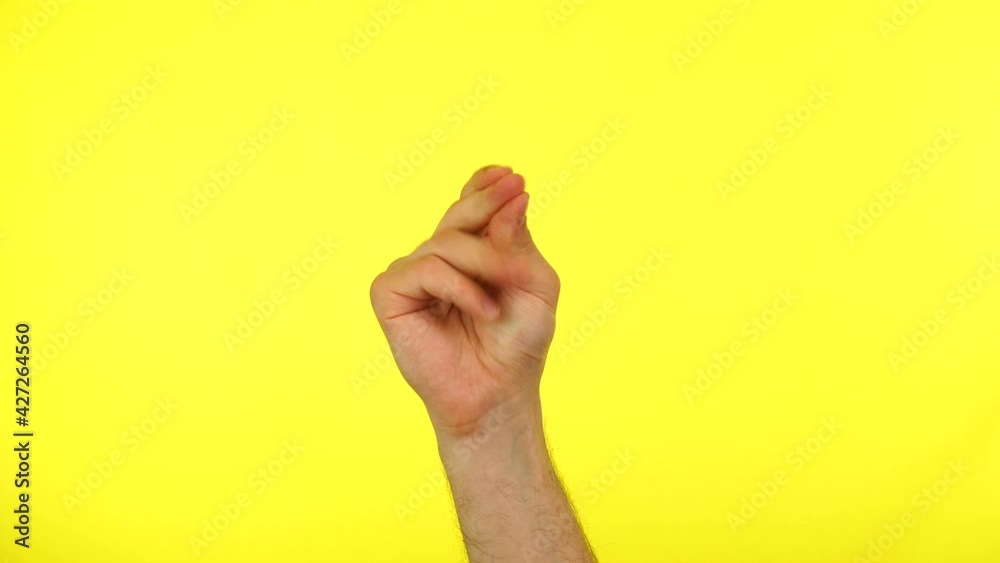 Man's hand snapping his finger doing the hand gesture isolated on a ...