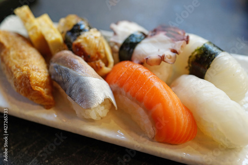 Sushi Set sashimi served on a white plate 