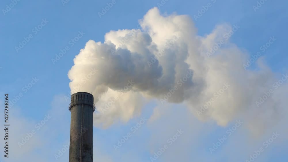 Smoking factory chimneys with co2 emissions.Environmental problem of environmental and air pollution.Climate change,ecology, global warming.The sky is smoky with toxic substances.Soot from factories Smoking factory chimneys with co2 emissions.Environmental problem of environmental and air pollution.Climate change,ecology, global warming.The sky is smoky with toxic substances.Soot from factories