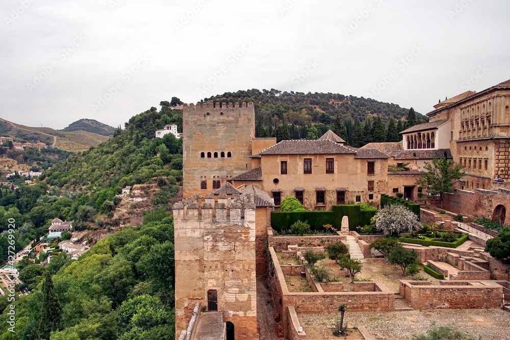 Alhambra or Red Castle in Granada spanish city, located on top of hill al-Sabika. Moorish palace fortress complex in Andalusia, Spain