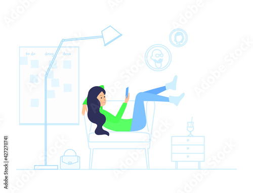 the employee lies and reads in the armchair a smartphone under a scrum board