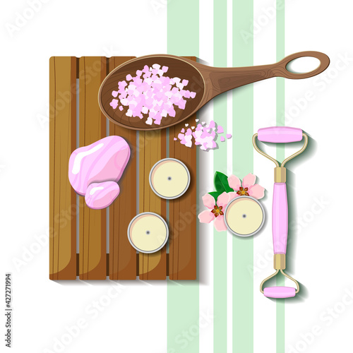 Spa procedure with rose salt and stone.