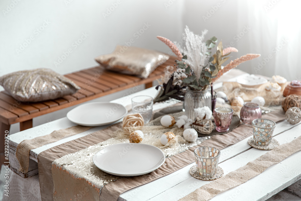 Home table setting for Easter celebration with decorative elements. Home table setting for Easter celebration with decorative elements.