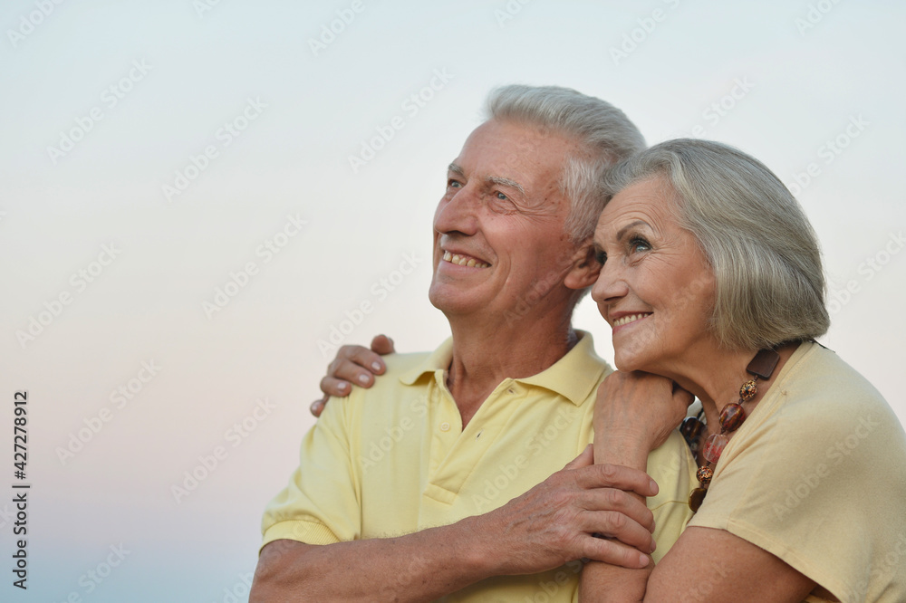 happy senior couple on a walk happy senior couple on a walk