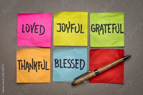 loved, joyful, grateful, thankful, blessed - inspirational and spiritual words on sticky notes, lifestyle, mindset and personal development concept