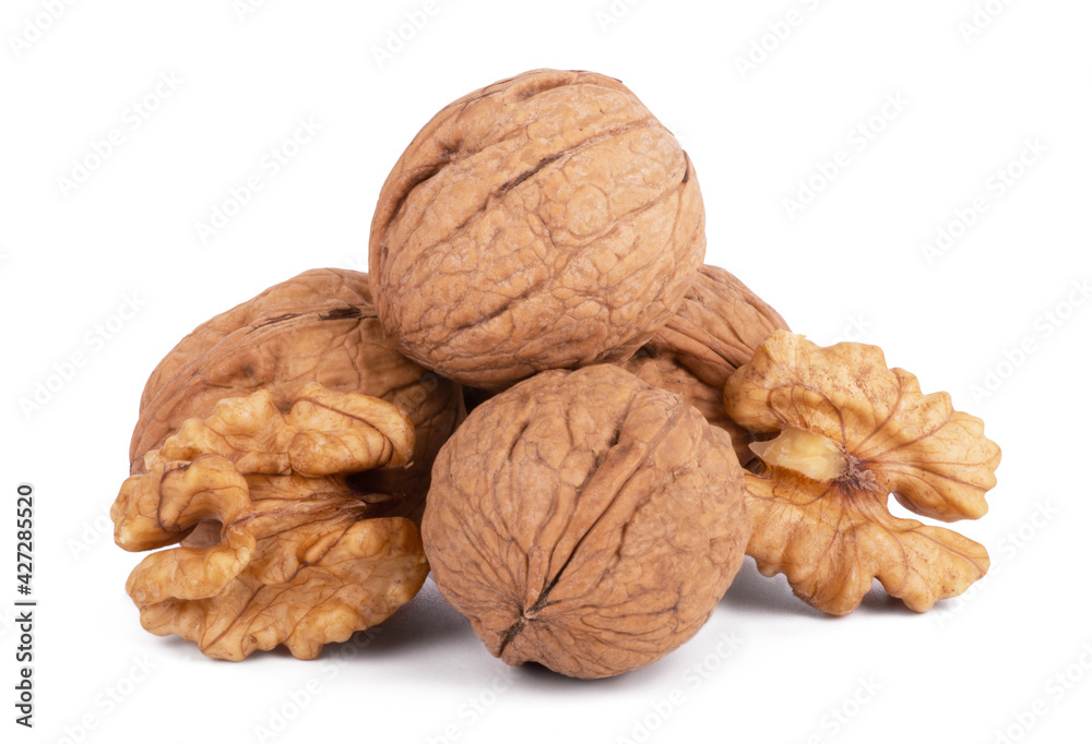 wallnut and a cracked walnut isolated on the white background wallnut and a cracked walnut isolated on the white background
