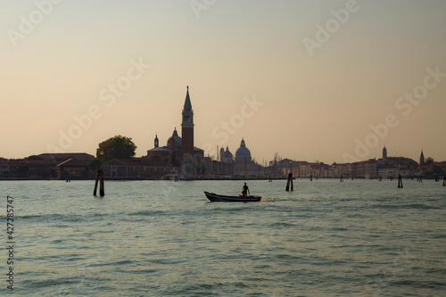 Approaching Venice in Italy at dusk by vaporetto or water bus.
