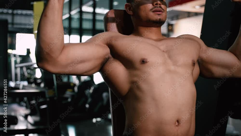 Sport Athlete man Workout Shoulder Press with barbell in Fitness gym Healthy Lifestyle bodybuilding, Active training builder muscles lifestyle. Sport Athlete man Workout Shoulder Press with barbell in Fitness gym Healthy Lifestyle bodybuilding, Active training builder muscles lifestyle.