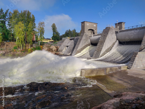 Hydroelectric power station. Start-up of a hydroelectric power station. Large flow of water.