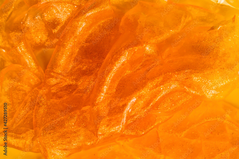 orange glitter texture. abstract background with waves orange glitter texture. abstract background with waves