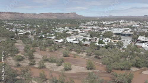 Buildings At Remote Town Of Alice Springs With Todd River - Tjoritja, MacDonnell Ranges In Northern Territory, Australia. - aerial photo