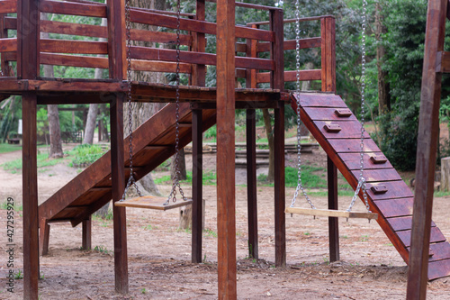 Wooden playground without kids during coronavirus. © fabianalejandro