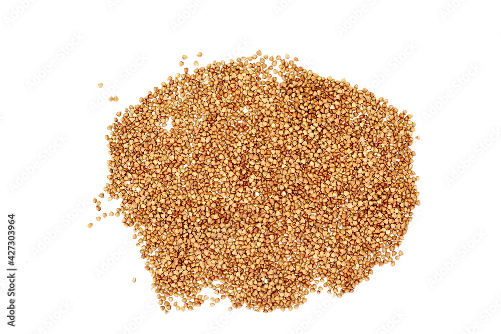 Buckwheat isolated on white background. Raw roasted brown seeds of buckwheat grain in heap. Flat lay top view photography Buckwheat isolated on white background. Raw roasted brown seeds of buckwheat grain in heap. Flat lay top view photography
