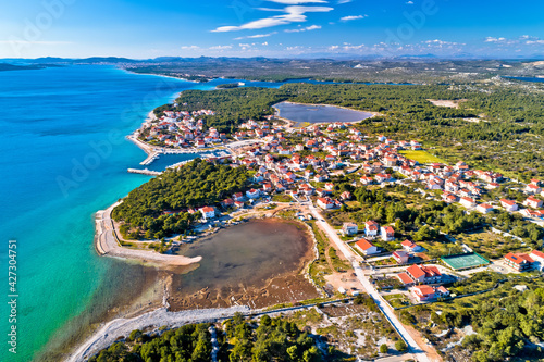Coastal village of Zablace aerial panoramic view, Sibenik archipelago