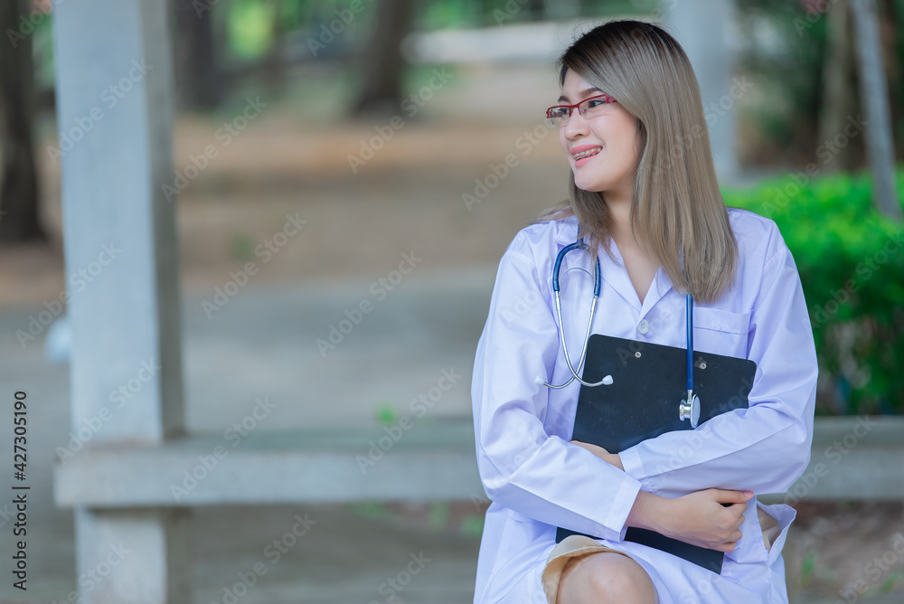 Portrait of young asian doctor wear glasses in a hospital,Thailand people Portrait of young asian doctor wear glasses in a hospital,Thailand people
