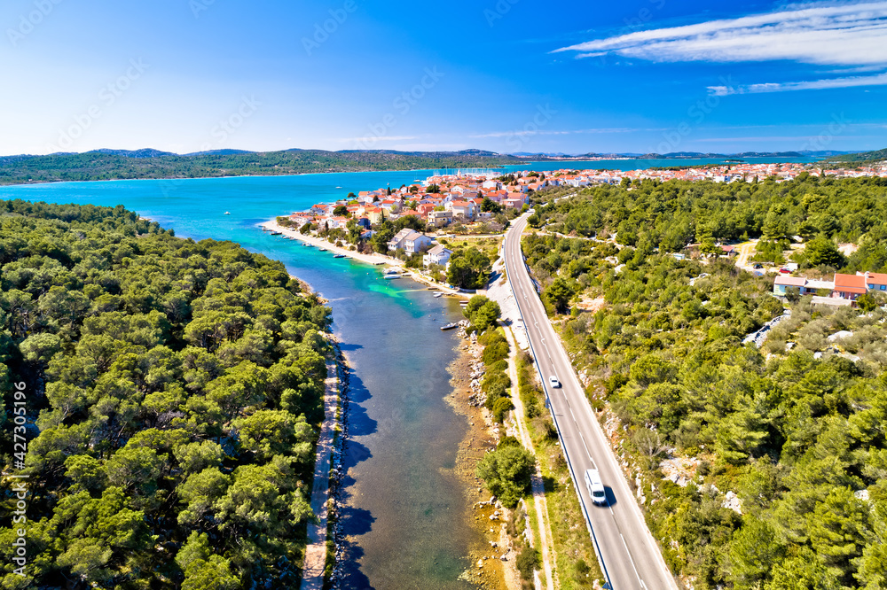 Adriatic town of Pirovac and Adriatic main road panoramic aerial view