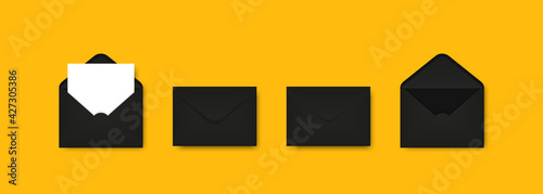 Set of black vector envelopes with shadow in different forms isolated on yellow background. Realistic black mockup envelope for letter or invitation card. Folded and unfolded envelope mockup set.