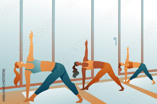 Girls at a joint yoga class in the gym. Pilates, sports, stretching, plastic figures of women. Bright gym, sport concept. A gift certificate for yoga.