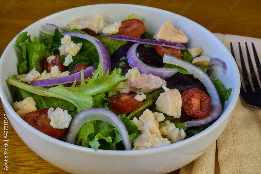 green salad top with onions and chicken meat green salad top with onions and chicken meat