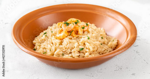Portion of risotto with prawn