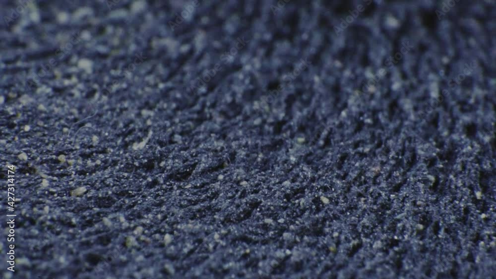 Iron powder movement of iron particles under the influence of a magnet. Abstract background. Slow Motion Iron powder movement of iron particles under the influence of a magnet. Abstract background. Slow Motion