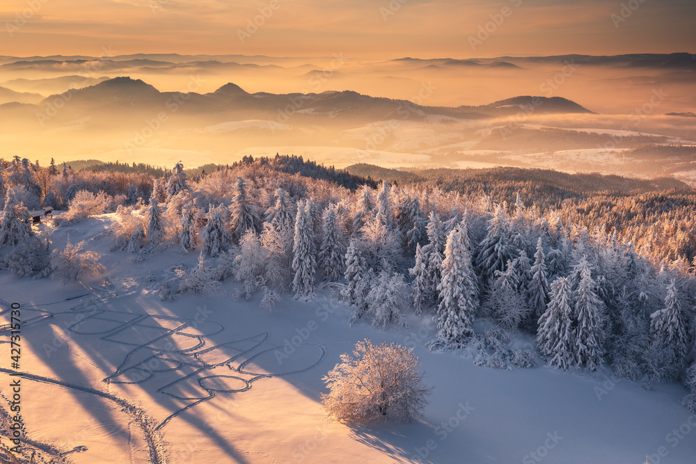 Winter morning in Gorce on the tower on the top of Lubań. A beautiful, romantic atmosphere with a view of the Pieniny Mountains, the Beskids and the Tatra Mountains.
Winter morning in Gorce on the tower on the top of Lubań. A beautiful, romantic atmosphere with a view of the Pieniny Mountains, the Beskids and the Tatra Mountains.