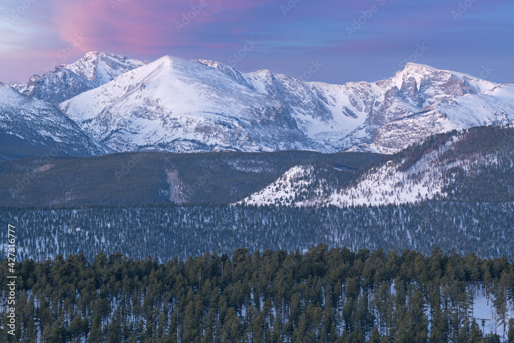 Winter landscape at sunrise of the snow flocked Rocky Mountains, Rocky Mountain National Park, Colorado, USA