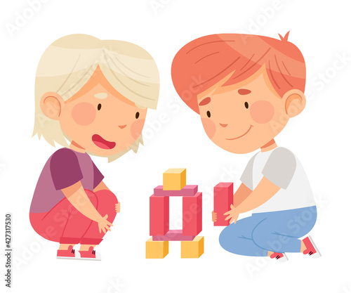 Excited Boy and Girl Sitting on the Floor in Nursery Playing Toy Blocks Vector Illustration