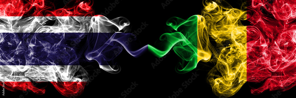 Thailand, Thai vs Mali smoky mystic flags placed side by side. Thick colored silky abstract smokes flags. Thailand, Thai vs Mali smoky mystic flags placed side by side. Thick colored silky abstract smokes flags.