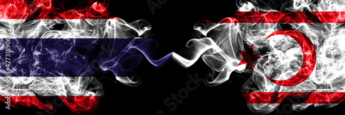 Thailand, Thai vs Northern Cyprus smoky mystic flags placed side by side. Thick colored silky abstract smokes flags.