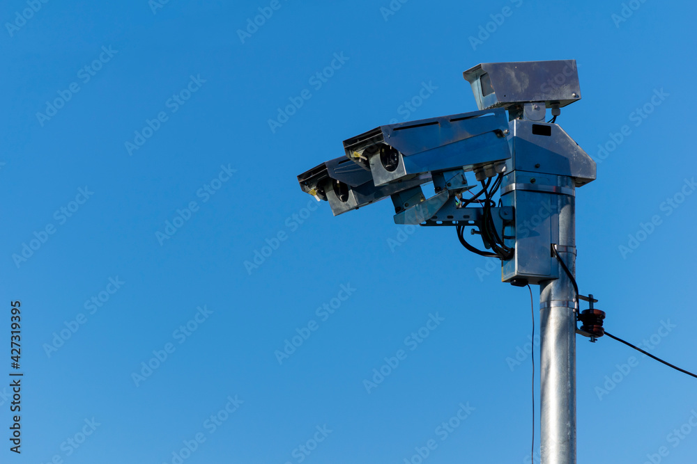 speed control photographic radar. blue sky background speed control photographic radar. blue sky background