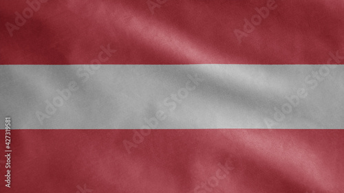 Austrian flag waving in the wind. Close up of Austria banner blowing, soft silk.